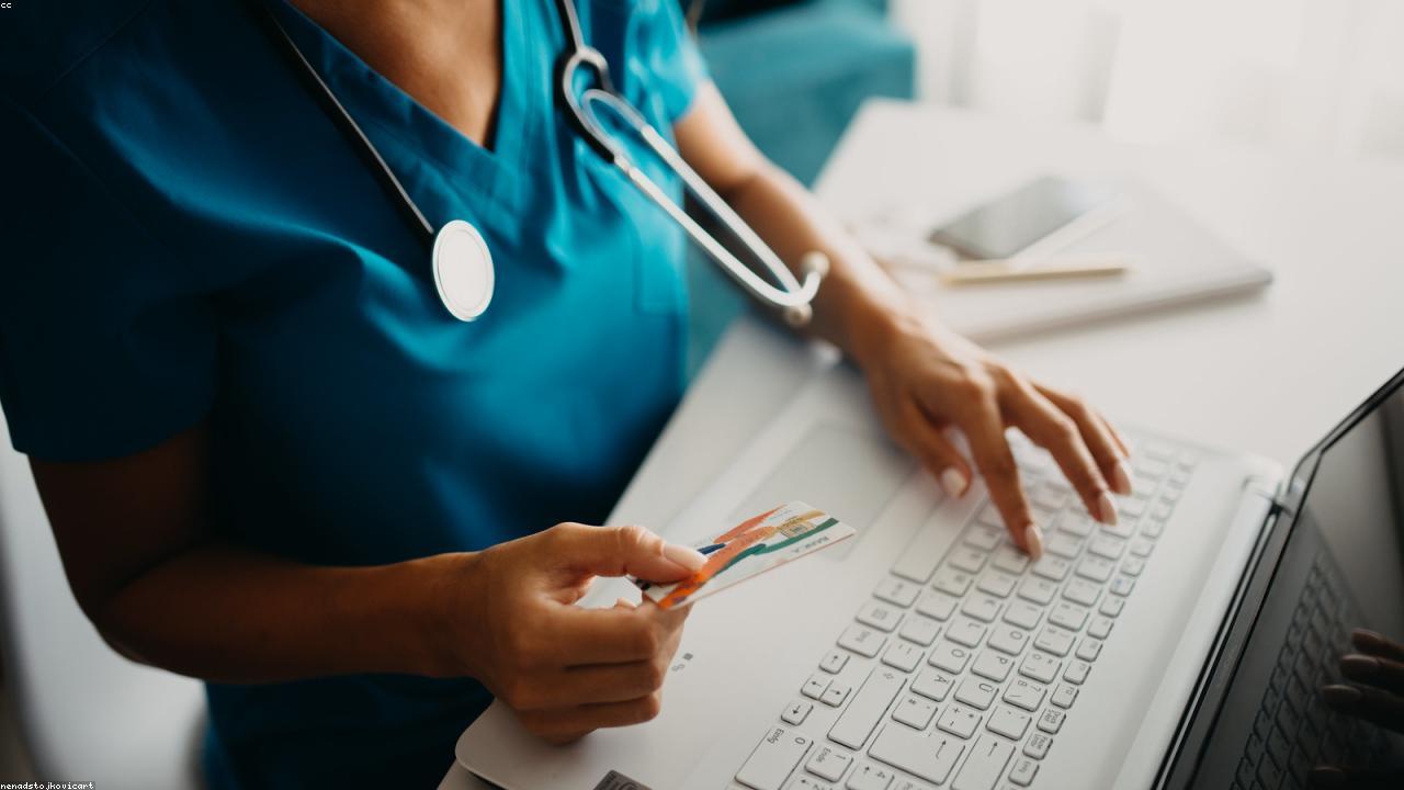 Healthcare staff assisting patients at a public health event